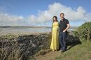 The Prime Minister David cameron and his wife Samantha pause by the coast path at Daymer Bay beach with the famous Doom Bar in the background on a sunny morning in Cornwall