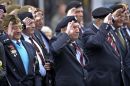 The same faces of the Royal British Legion salute and pay their respects