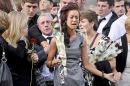 Grief overcomes family and friends as the cortege moves off the High Street